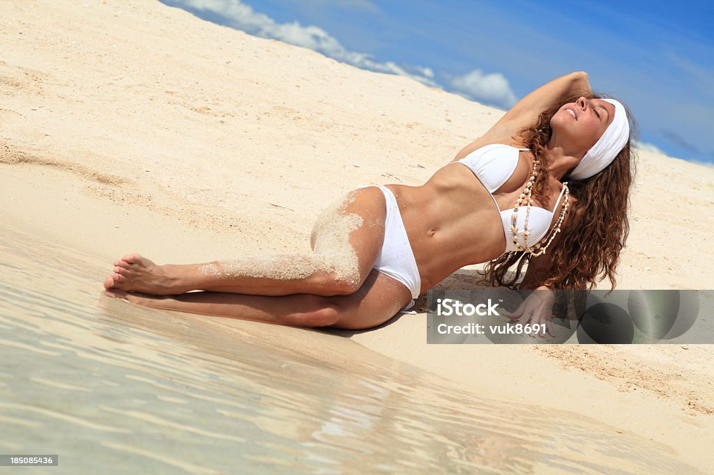 Enjoying the tropical beach Attractive woman enjoying the tropical Philippine beach Adult Stock Photo