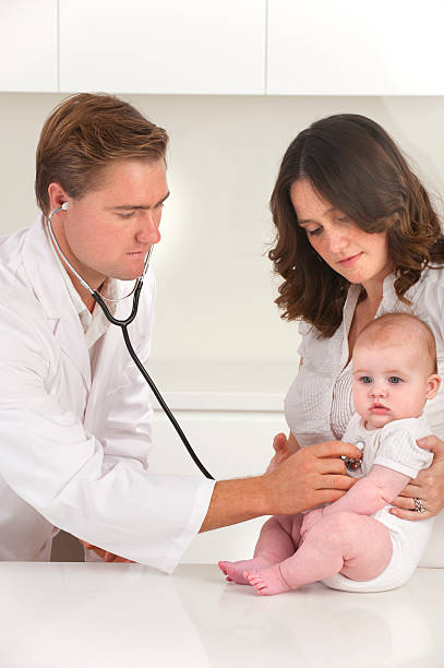 istock Pediatrician checking baby patient 185085449