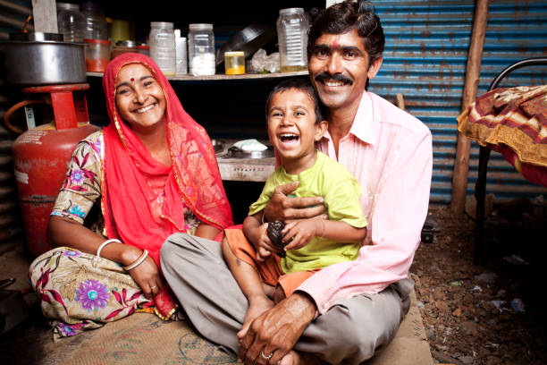 Cheerful Rajasthani Rural Indian Mother Father and Son.