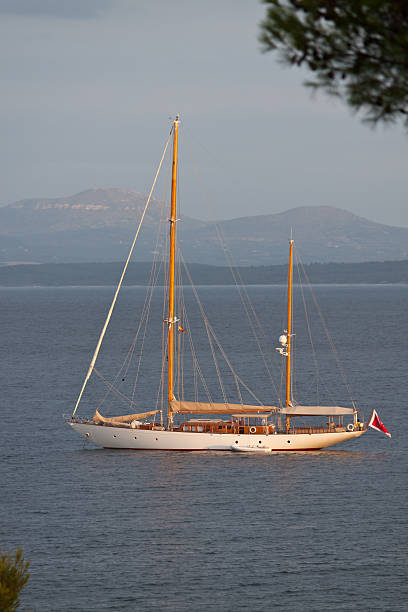 istock Sailboat moored off in quiet harbour 185085488