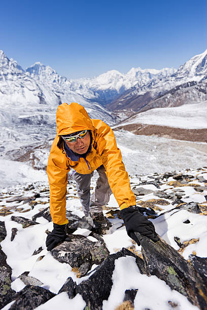 istock Nepali sherpa climbing in Himalayas 185085560