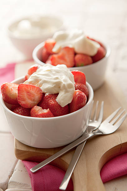 istock Desserts: Strawberries and Cream Still Life 185085928