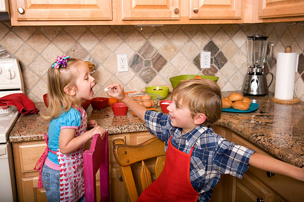 istock Happy Boy and Girl Baking in the Kitchen 185086268