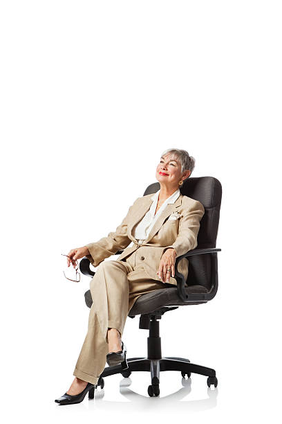 istock Smiling Senior Businesswoman Thinking Success 185086404