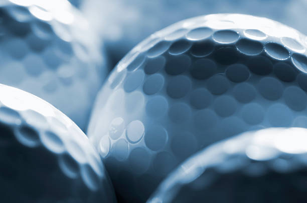 Detail of white golf balls close up and cropped Golf Balls golf ball photos stock pictures, royalty-free photos & images