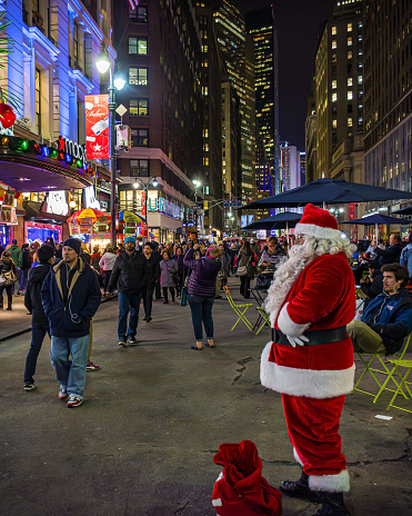NEW YORK-DECEMBER 21 - Santa Claus outside Macys in Herald Square during the holidays on December 21 2015 in New York City.