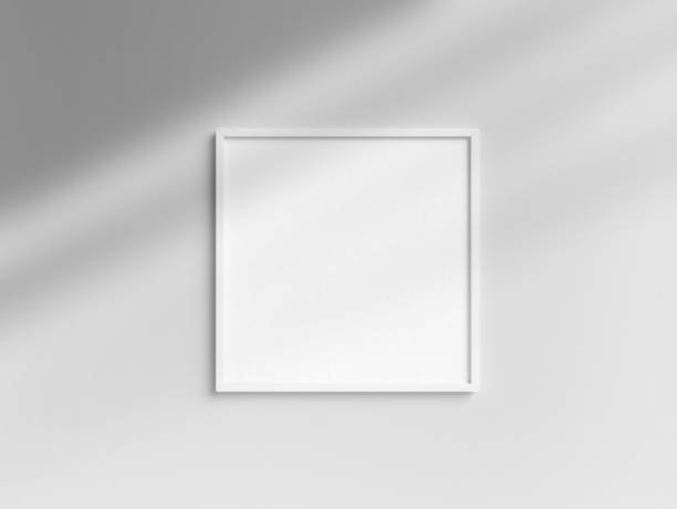 istock Blank square white photo frame template hanging on the wall 1850867859