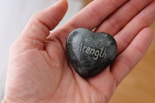 istock Polished Stone Heart and Hand 185087520