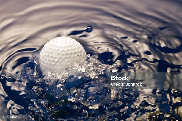 Closeup Of Golf Ball Landing In The Water Splashing Stock Photo - Download Image Now