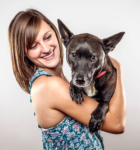 istock Young adult with her dog. 185088078