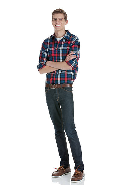 istock Happy man standing with his arms crossed 185089070