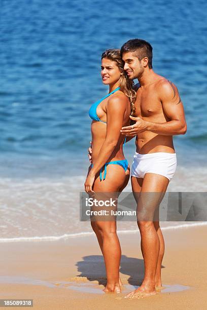 Young Couple In The Beach Stock Photo - Download Image Now - Women, Brazil, Men
