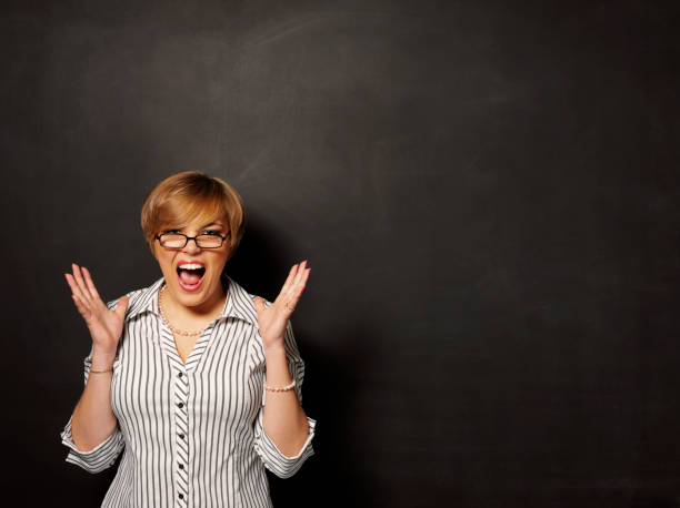 istock Stress on the Face and a Blackboard 185089614