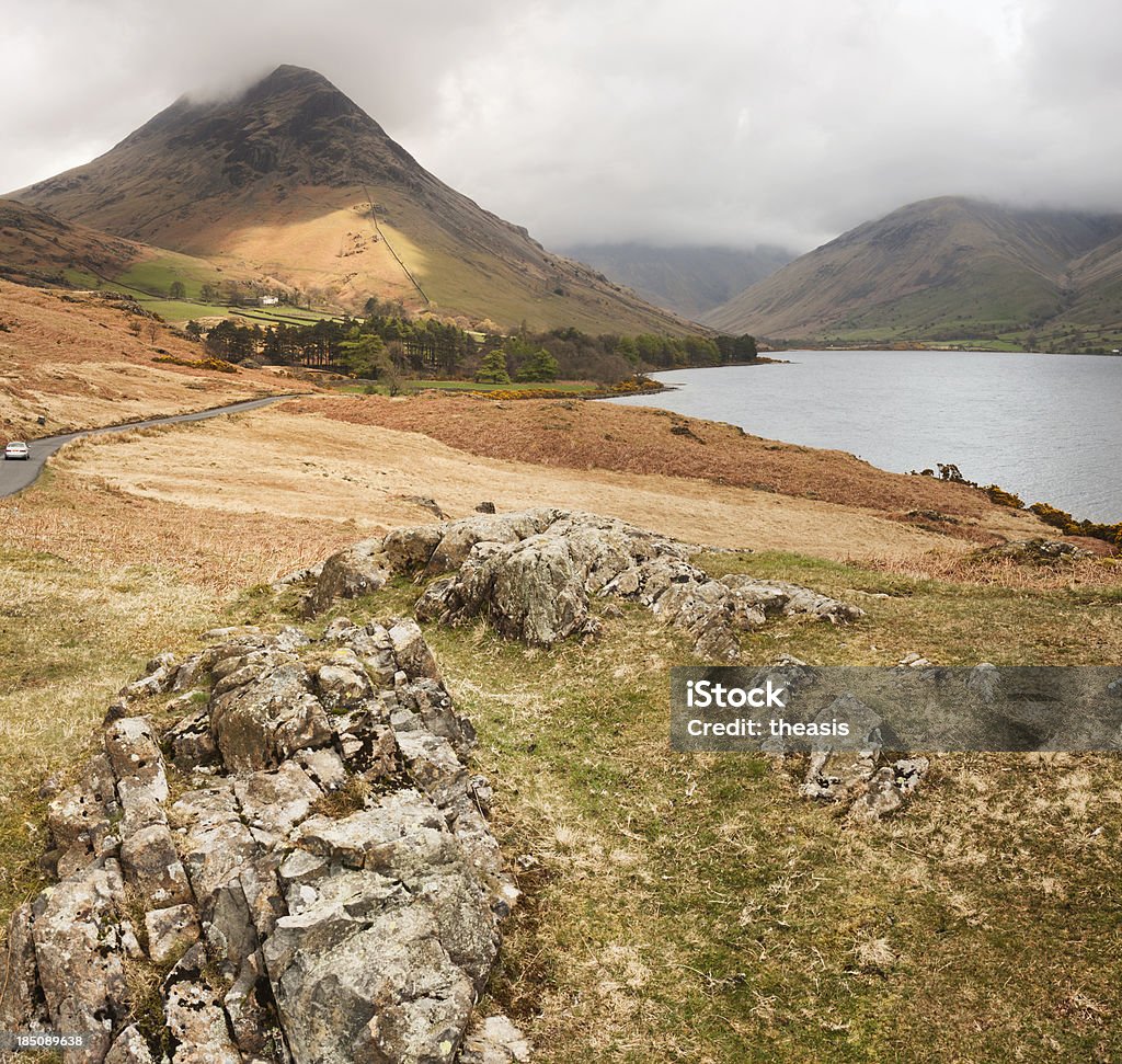 Yewbarrow And Wast Water The peak of Yewbarrow by Wast Water and Wasdale Head in the English Lake District. Agricultural Field Stock Photo