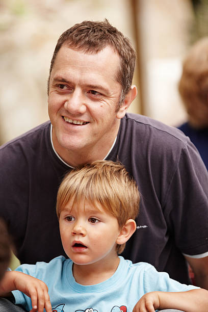 istock Father and son travelling on miniature train 185090209