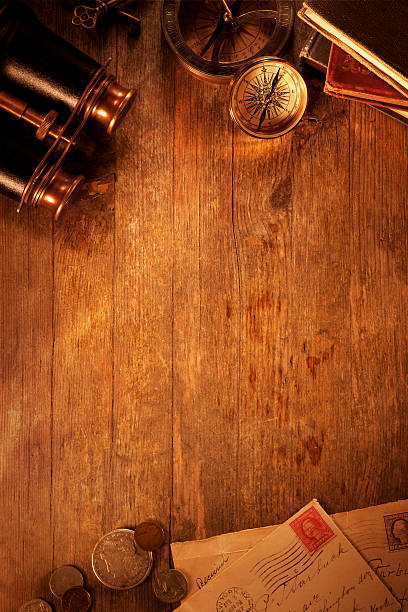 istock Antique objects on a Old Wooden Desk 185090338