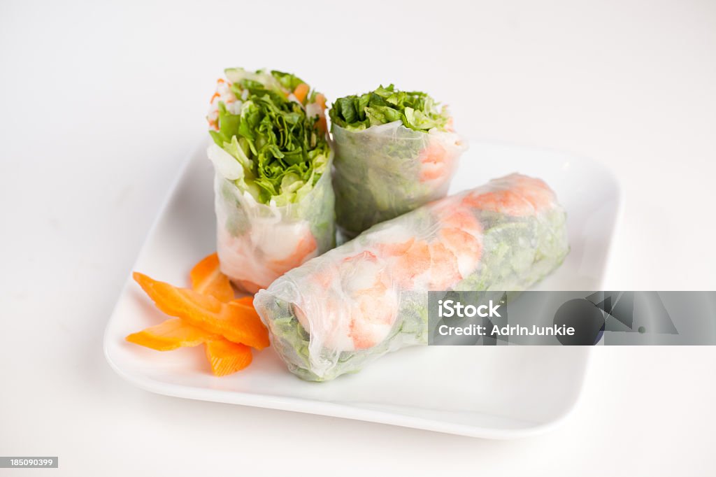 Asian roll sliced and displayed on white background  Spring rolls isolated on white background Spring Roll Stock Photo