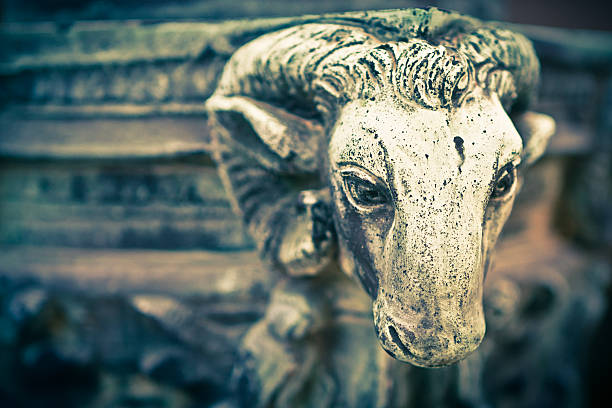 Goat's Head Statue in Old Cemetery Nineteenth-century metal statue of a goat in an italian cemetery. satan goat stock pictures, royalty-free photos & images