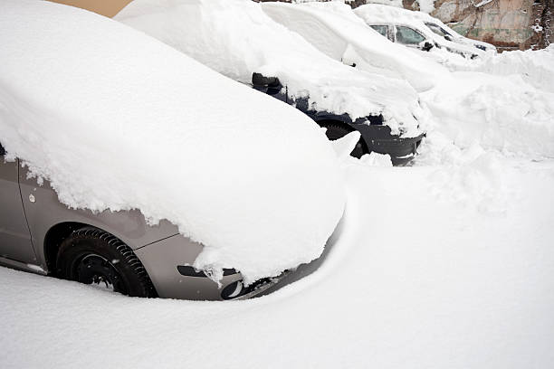 istock Snow covered cars 185090756