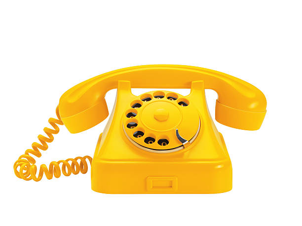 Telephone (Click for more) Telephone Isolated On Yellow stock pictures, royalty-free photos & images