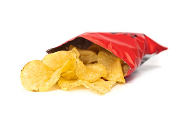 Potato Chips A Packet of Potato Chips or Crisps potato chip photos stock pictures, royalty-free photos & images