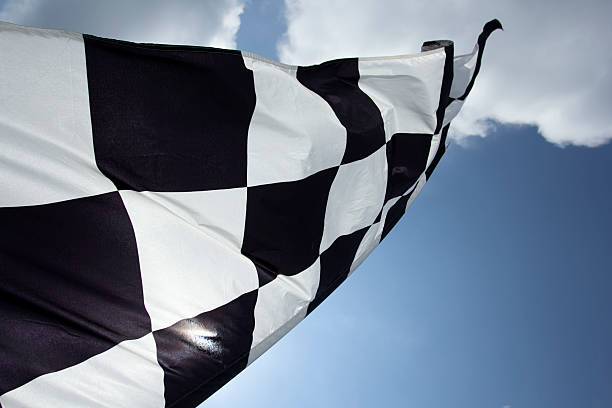 istock Close up of checkered flag in sky 185091180