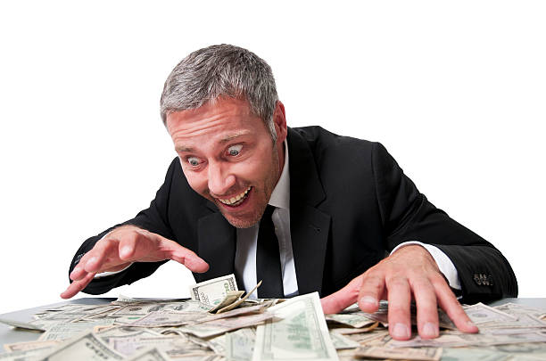 sorridente uomo d'affari con banconote dollaro - greed foto e immagini stock