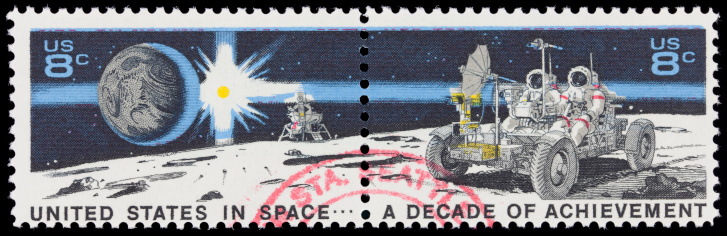 Postmarked stamp with the United States flag and the Earth in the sky above. USA 42 cents.