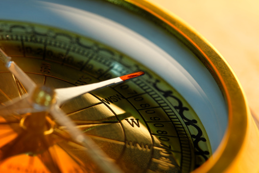 Close up of a compass. Shot with shallow depth of field.