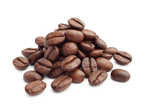 heap of coffee beans isolated on white