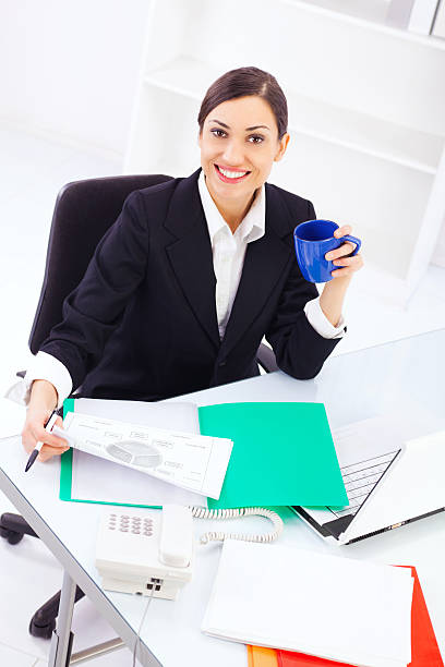 istock Beautiful business woman working in office 185093004