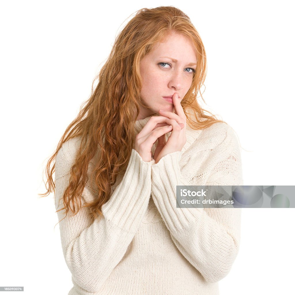 Thinking Young Woman Looking at Camera Portrait of a young woman on a white background. http://s3.amazonaws.com/drbimages/m/eb.jpg 20-24 Years Stock Photo