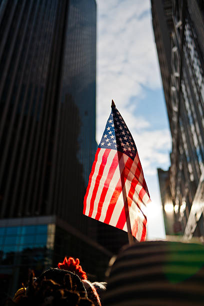 istock American flag in sunlight city 185093130