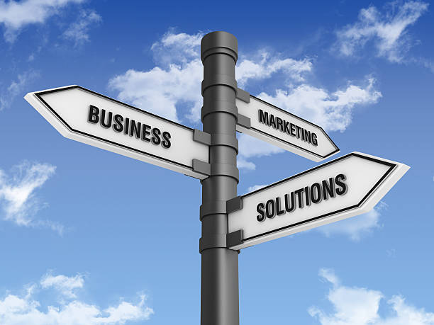 istock Directional Sign with MARKETING BUSINESS SOLUTIONS Words and Sky 185093261