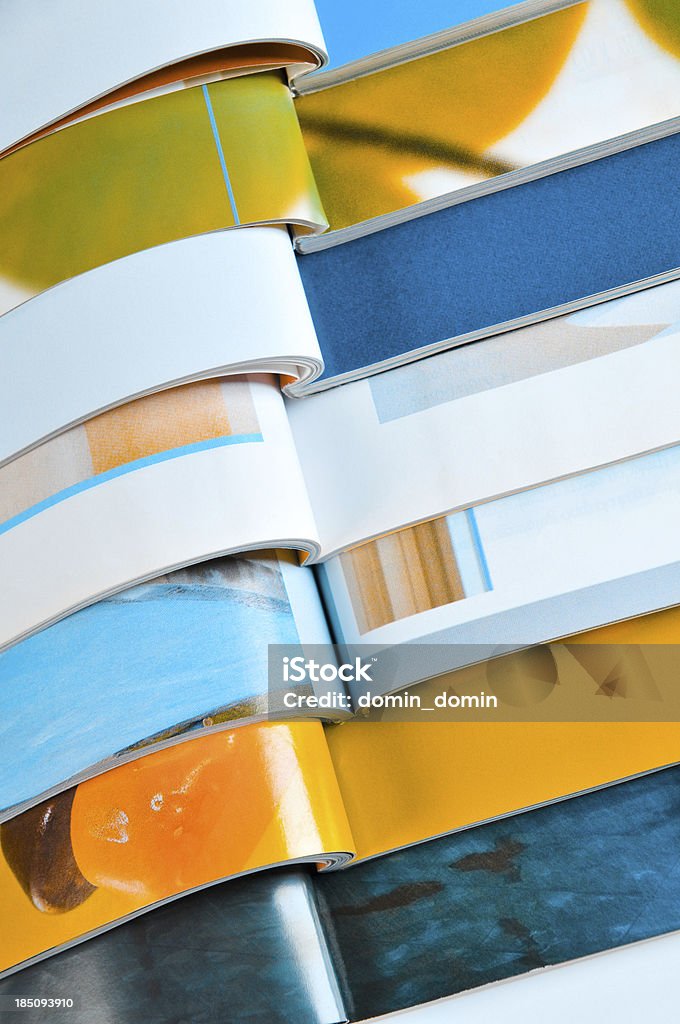 Colourful magazines "Stack of colourful magazines, close-up." Arts Culture and Entertainment Stock Photo