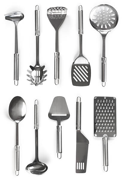 Kitchen utensils "Collection of kitchen utensils on white. This file is cleaned, retouched and contains" serving utensil stock pictures, royalty-free photos & images