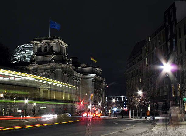 istock Blurred motion by traffic in front of Reichstag building Berlin 185094191
