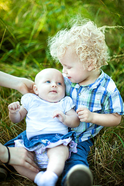 istock Big Brother With Baby Sister 185094596