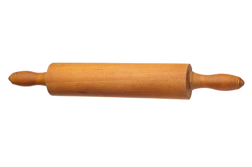A rolling pin used for flattening dough.