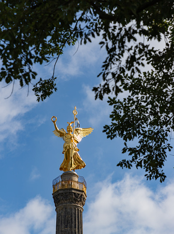 Montreal elevated view of the old town with a 19th century angel statue in the foreground