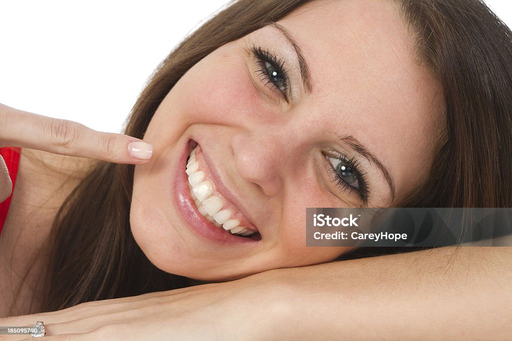 close up of beautiful girl close up of cute girl pointing at her perfect smile 20-29 Years Stock Photo