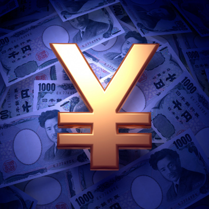 Japanese Yen notes and Golden Yen sign on them.For more money and finance images: