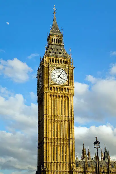 Photo of Big Ben at afernoon with moon