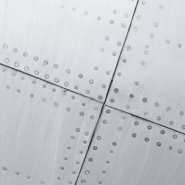 close-up de uma textura de fundo de aeronave - rivet metal textured steel - fotografias e filmes do acervo