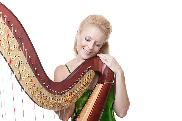 istock Smiling woman with harp 185096084