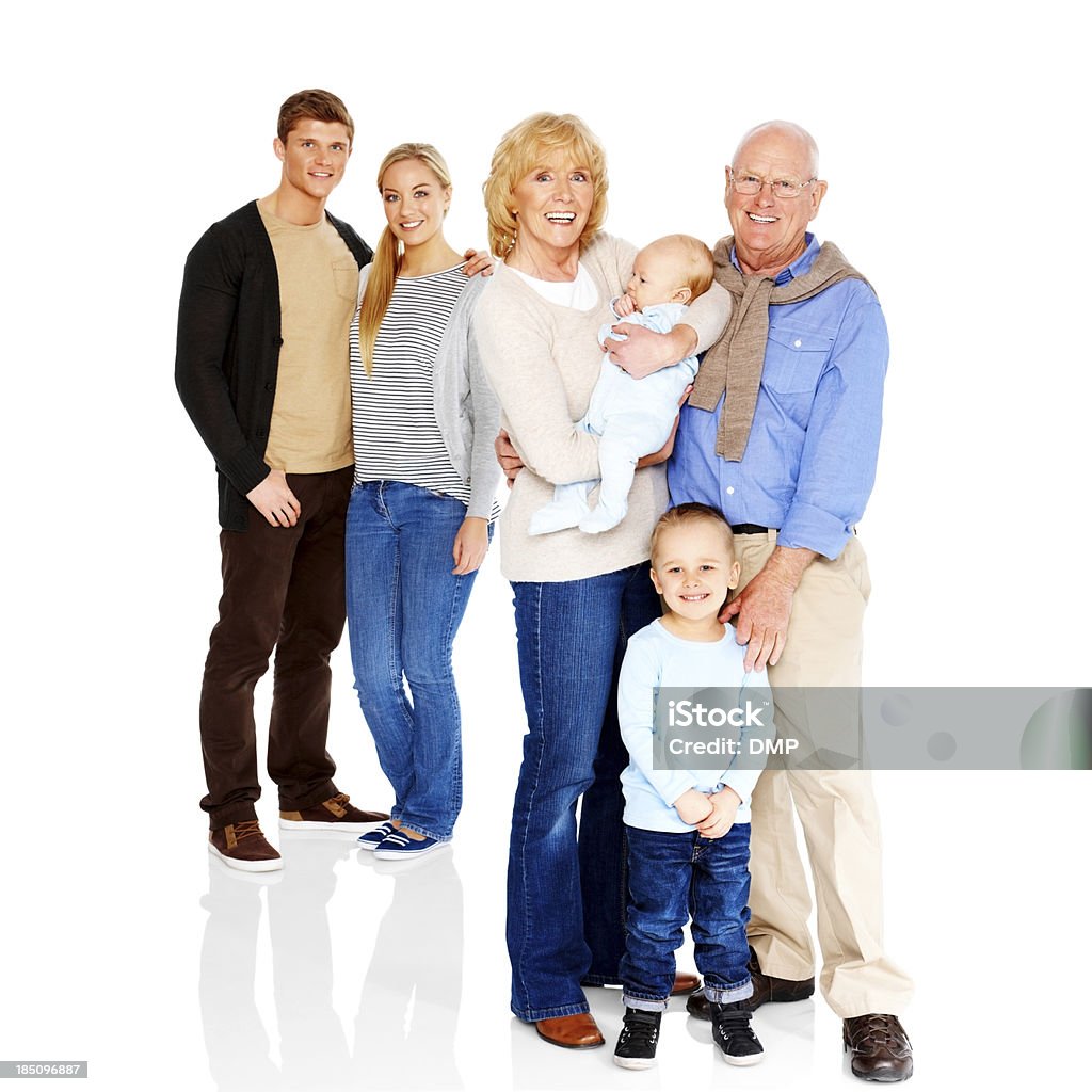 Ritratto di famiglia estesa in piedi insieme - Foto stock royalty-free di Accudire