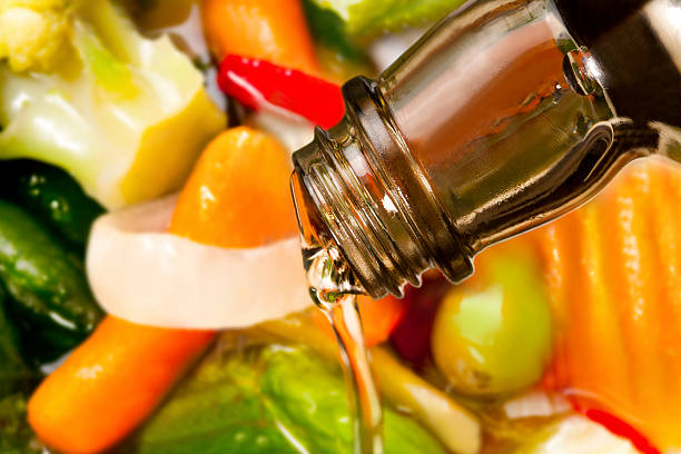 Glass bottle with extra virgin olive oil and balsamic vinegar