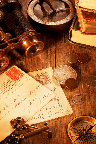 istock Antique objects on a Old Wooden Desk 185097179
