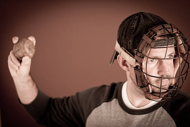 istock Vintage Baseball Player Preparing to Throw the Ball 185097229