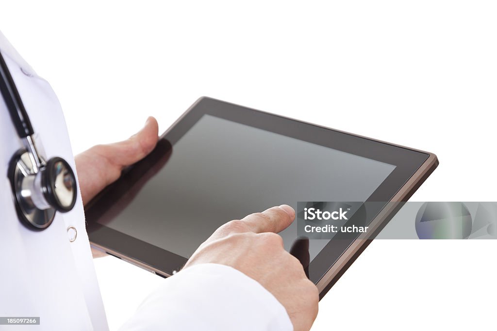 Manos sosteniendo Digital Tablet médico - Foto de stock de Tableta digital libre de derechos